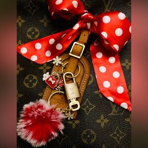 Louis Vuitton name tag, padlock, key bundle